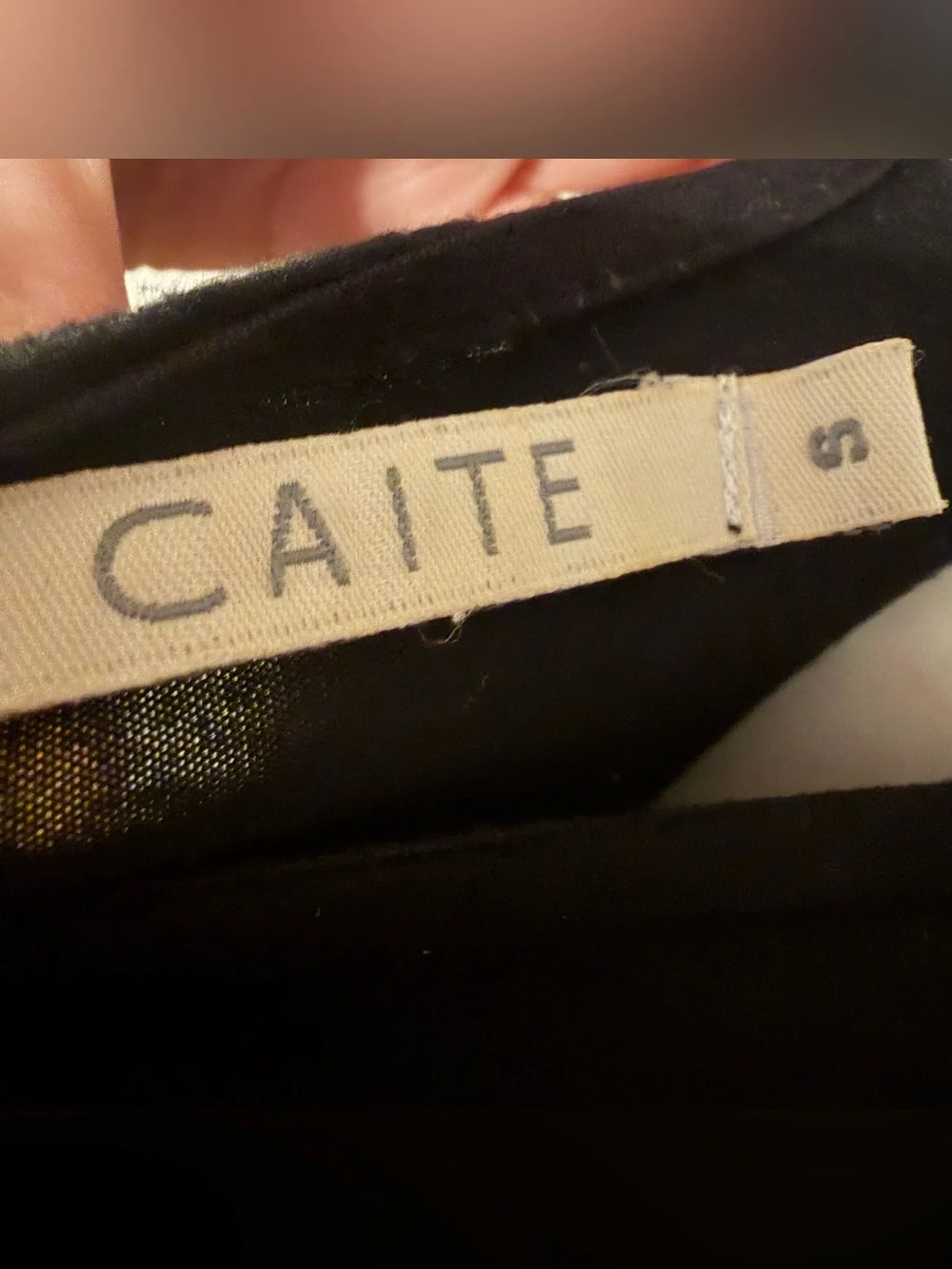 Caite charming black